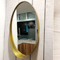 Miroir ovale en métal couleur or 61,5x37,5cm